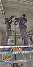 les-bras-de-support-ont-ete-installes-par-nos-techniciens-specialises